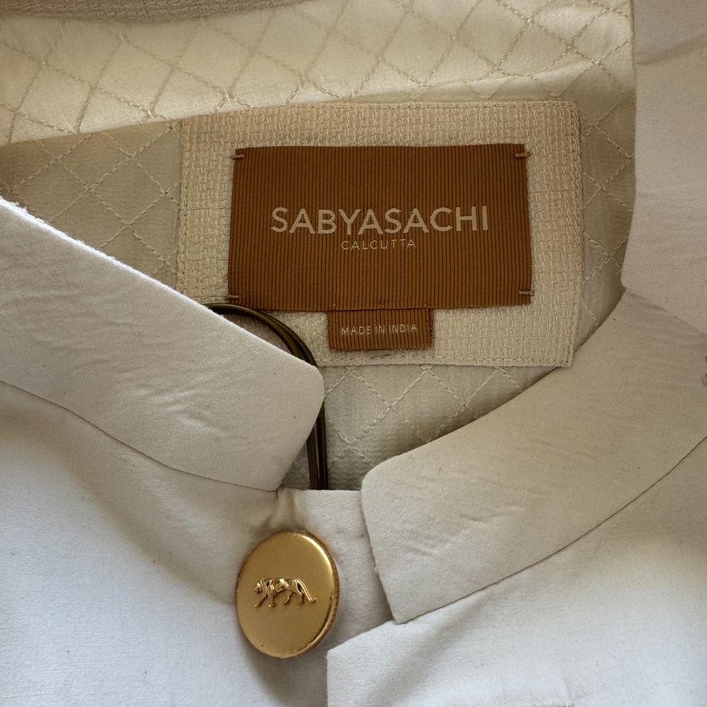 Sabyasachi Ivory Garment with Gold Accent